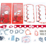 "Close-up image of high-quality head gaskets and cylinder heads, showcasing performance engine products ideal for turbo upgrades and diesel engine rebuild kits, including Powerstroke parts for enhanced engine efficiency."