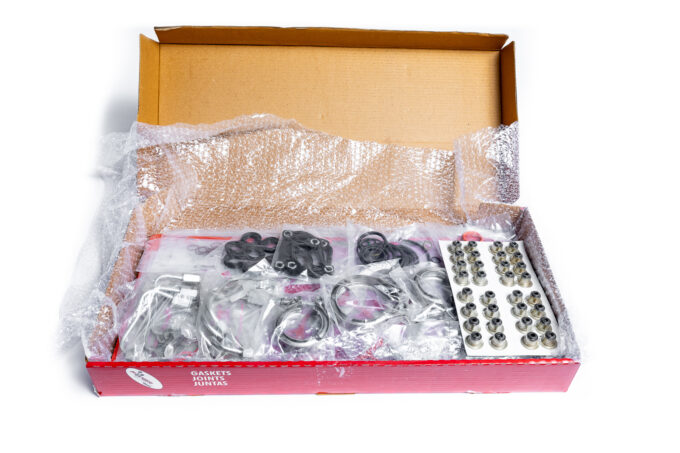 "High-quality head gaskets and cylinder heads for performance engine products, featuring turbo upgrades and diesel engine rebuild kits, including Powerstroke Parts, showcased in image _Z9A587."