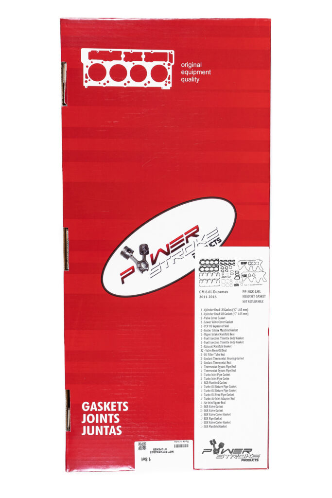 "High-quality head gaskets and cylinder heads displayed in a performance engine products setup, showcasing turbo upgrades and diesel engine rebuild kits, ideal for Powerstroke Parts enthusiasts."