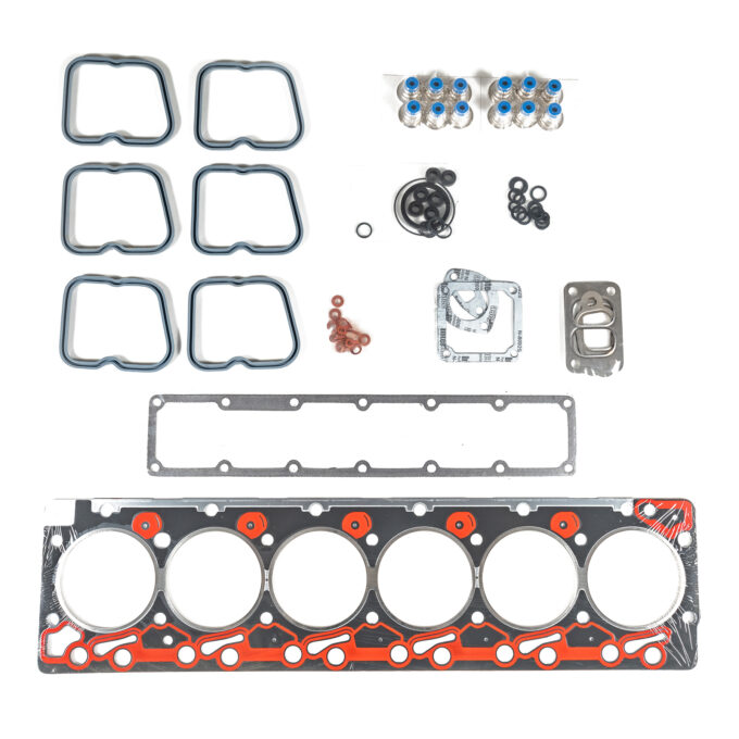 "Close-up image of high-quality head gaskets and cylinder heads, showcasing performance engine products ideal for turbo upgrades and diesel engine rebuild kits, including Powerstroke parts for enhanced engine efficiency."
