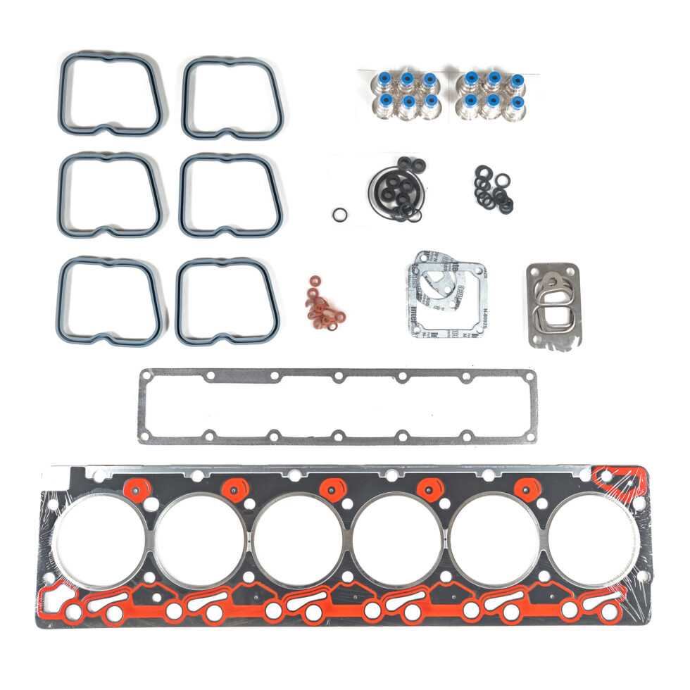 "Close-up image of high-quality head gaskets and cylinder heads, showcasing performance engine products ideal for turbo upgrades and diesel engine rebuild kits, including Powerstroke parts for enhanced engine efficiency."