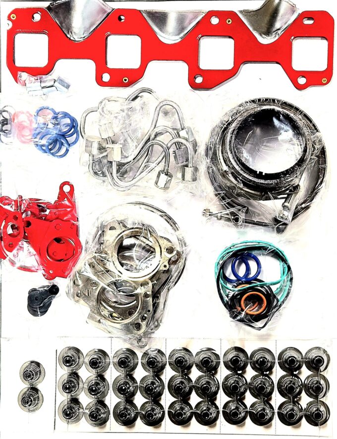"High-quality L5P engine components in a box, featuring essential head gaskets and cylinder heads for performance engine products, ideal for turbo upgrades and diesel engine rebuild kits, including premium Powerstroke parts."